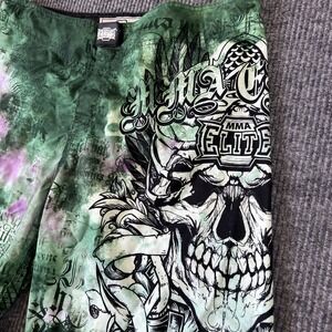 Y2K MMA Elite GREEN Skull AOP Sword Cryptic Writing Board Shorts L Measures 38‎